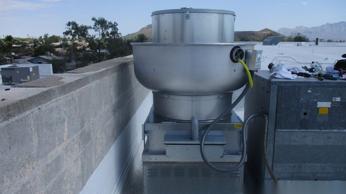 Installed rooftop commercial kitchen exhaust fan